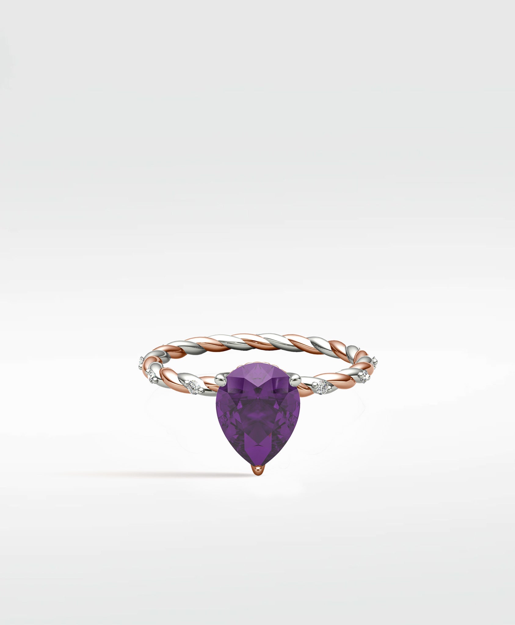 Violet Elm Engagement Ring with a pear-shaped amethyst on a twisted, two-tone rose and white gold band with diamond accents.