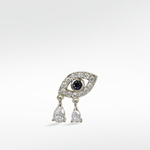White gold evil eye earring with a sapphire pupil, diamond outline, and two dangling pear-shaped diamond drops.