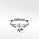 The Zamifolia platinum engagement ring with a round brilliant diamond and a pavé-set split shank band.