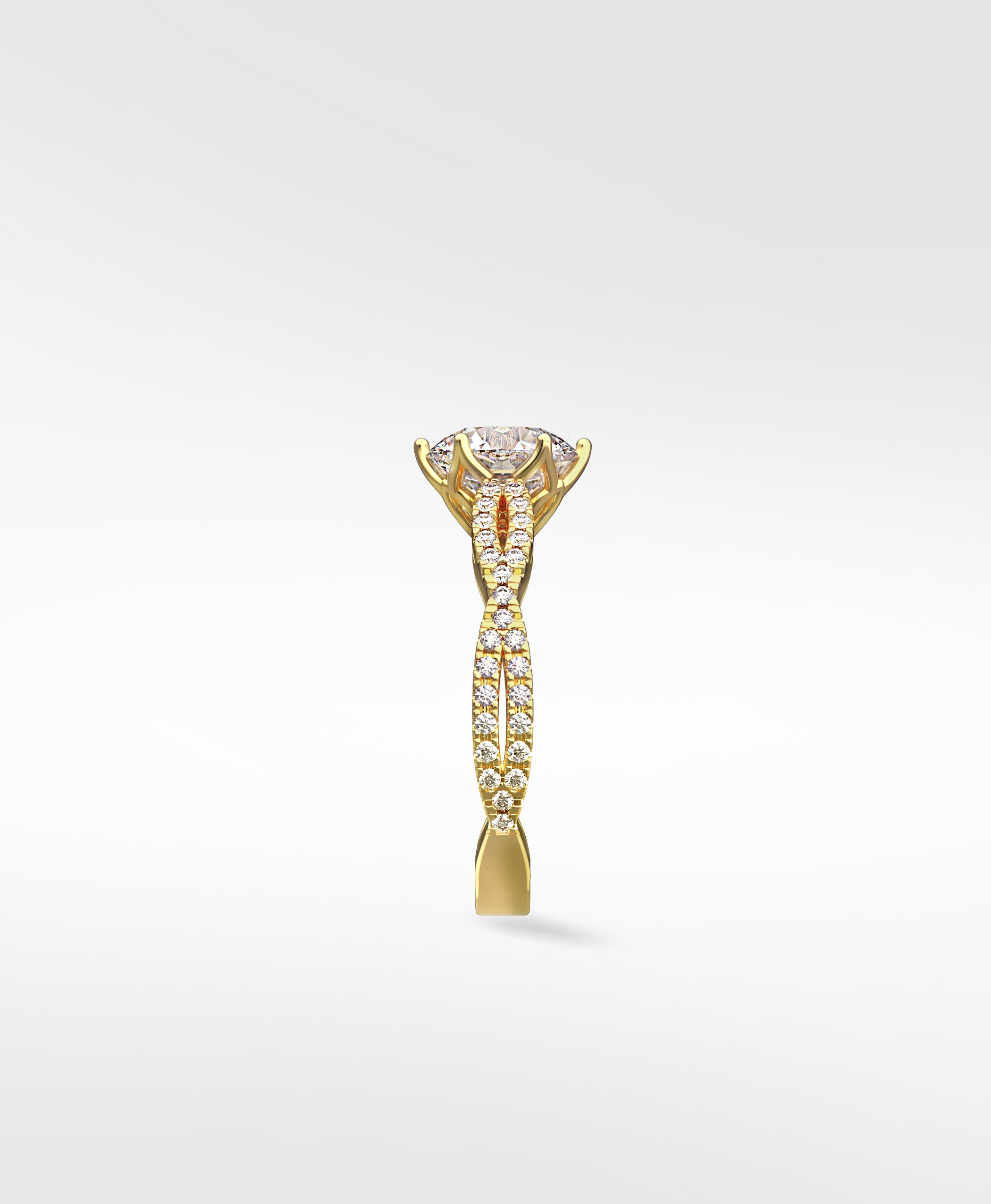 Side profile of the yellow gold Zamifolia Engagement Ring with its intricate twisted pavé diamond band.