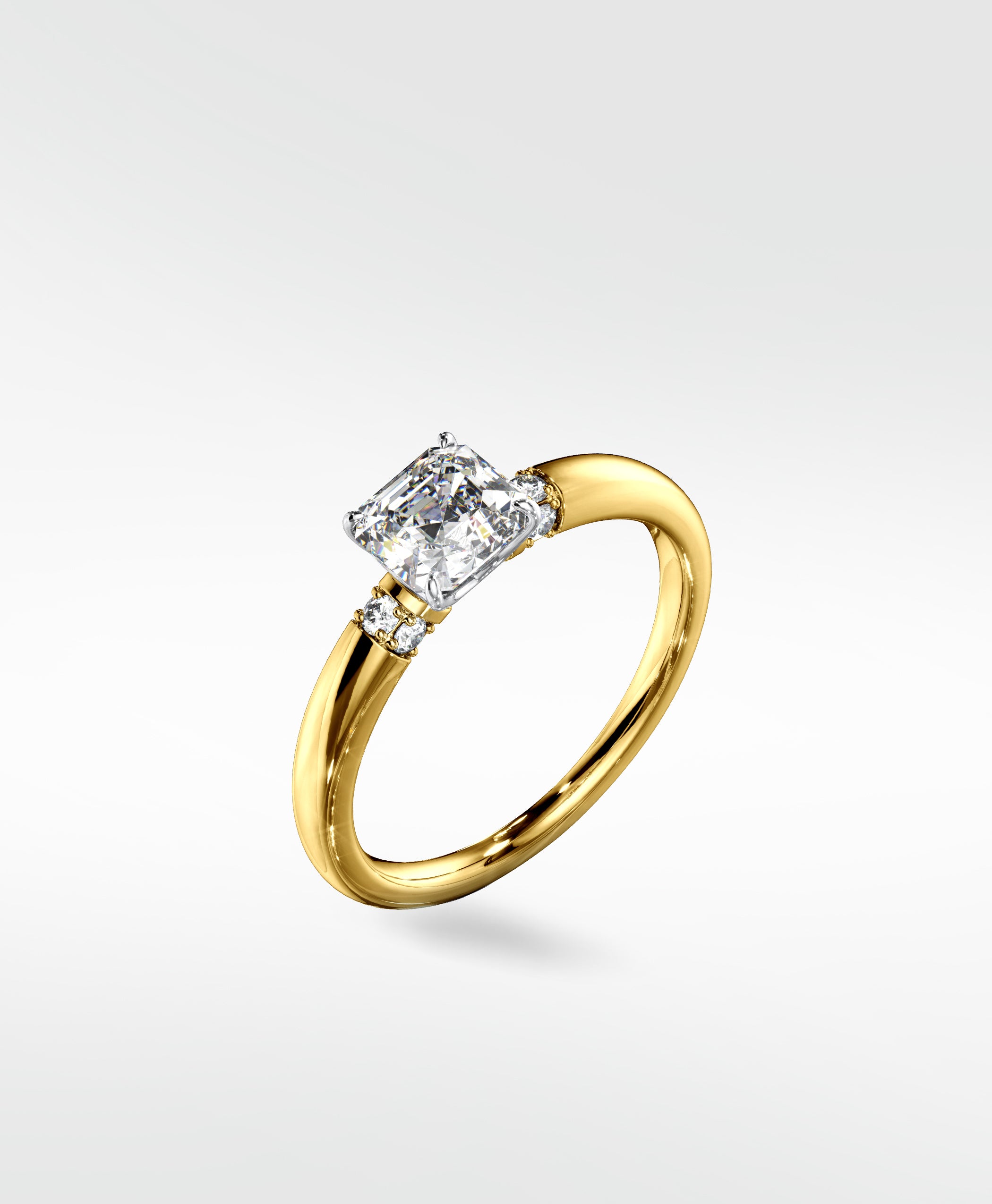 The Cacao Engagement Ring in yellow gold, featuring a vintage-inspired design with a brilliant square-cut diamond and accent stones.