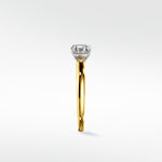 Side profile of the Cacao Engagement Ring in yellow gold with an emerald-cut diamond in a vintage-style platinum setting.