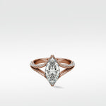 Lark & Berry Chestnut Diamond Engagement Ring with a marquise-cut diamond on a rose gold pavé band.