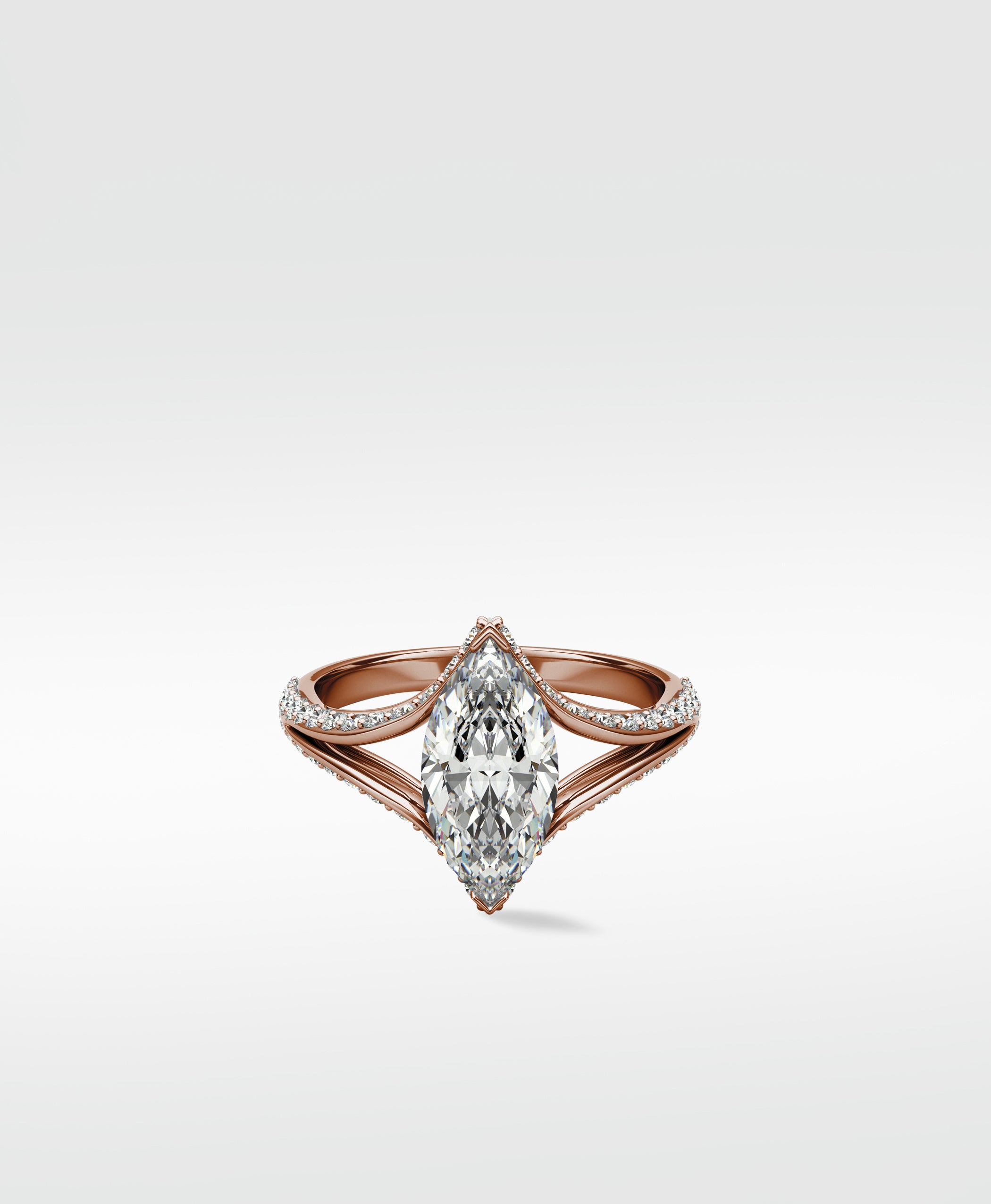 Lark & Berry Chestnut Diamond Engagement Ring with a marquise-cut diamond on a rose gold pavé band.