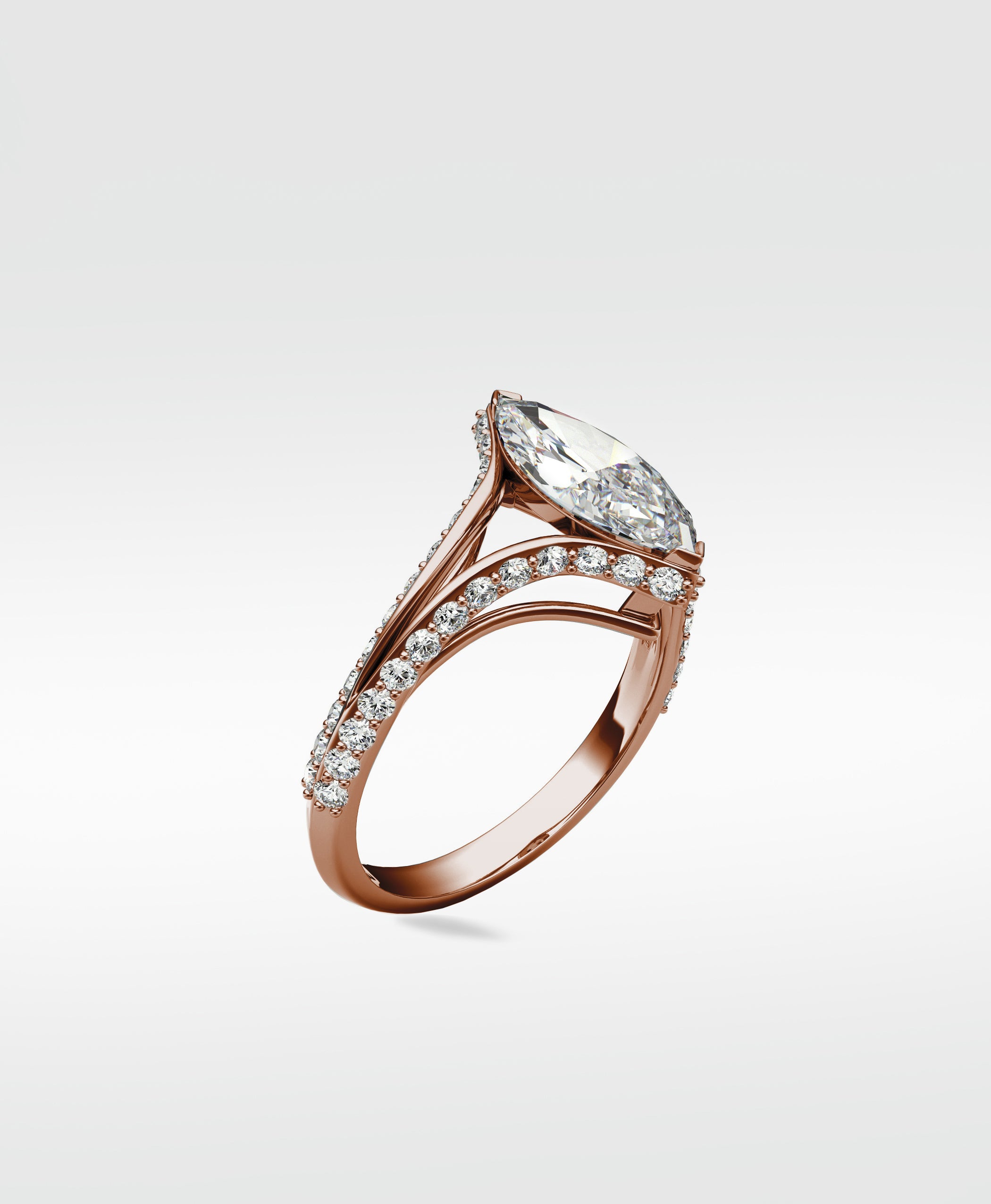 Chestnut Diamond Engagement Ring with a marquise-cut diamond on a pavé-set split shank band in rose gold.