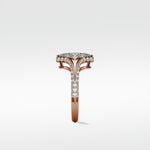 A detailed side view of the rose gold Chestnut Diamond Engagement Ring, featuring a pavé split shank and diamond halo.