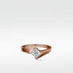 The Elder Engagement Ring featuring a princess cut diamond in a modern, twisted rose gold setting on a white background.