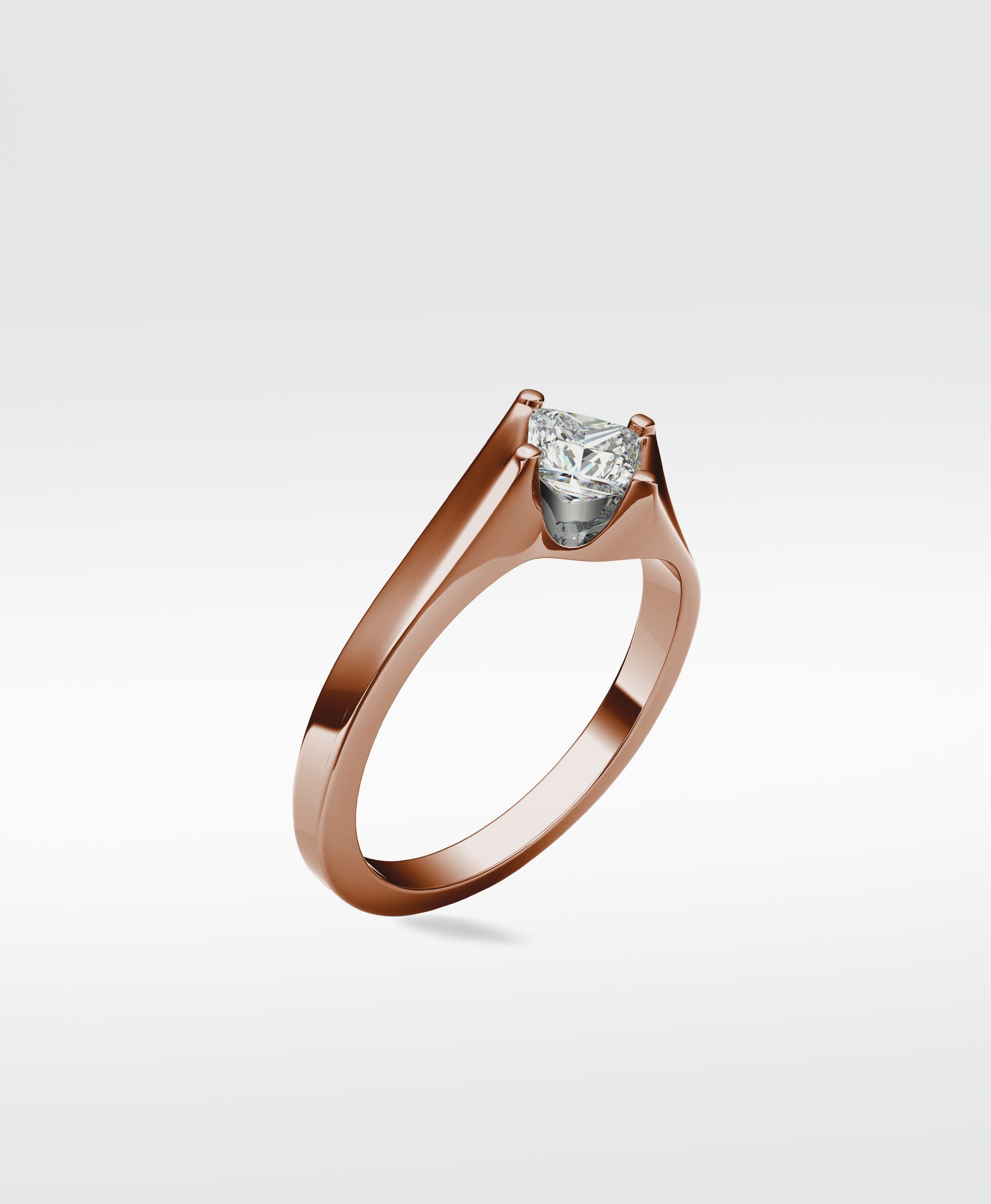 The Elder Engagement Ring in polished rose gold, featuring a princess cut diamond in a modern, clean-lined setting.