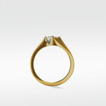 Profile view of the Elder Engagement Ring in yellow gold with a modern, clean-lined setting holding a princess cut diamond.