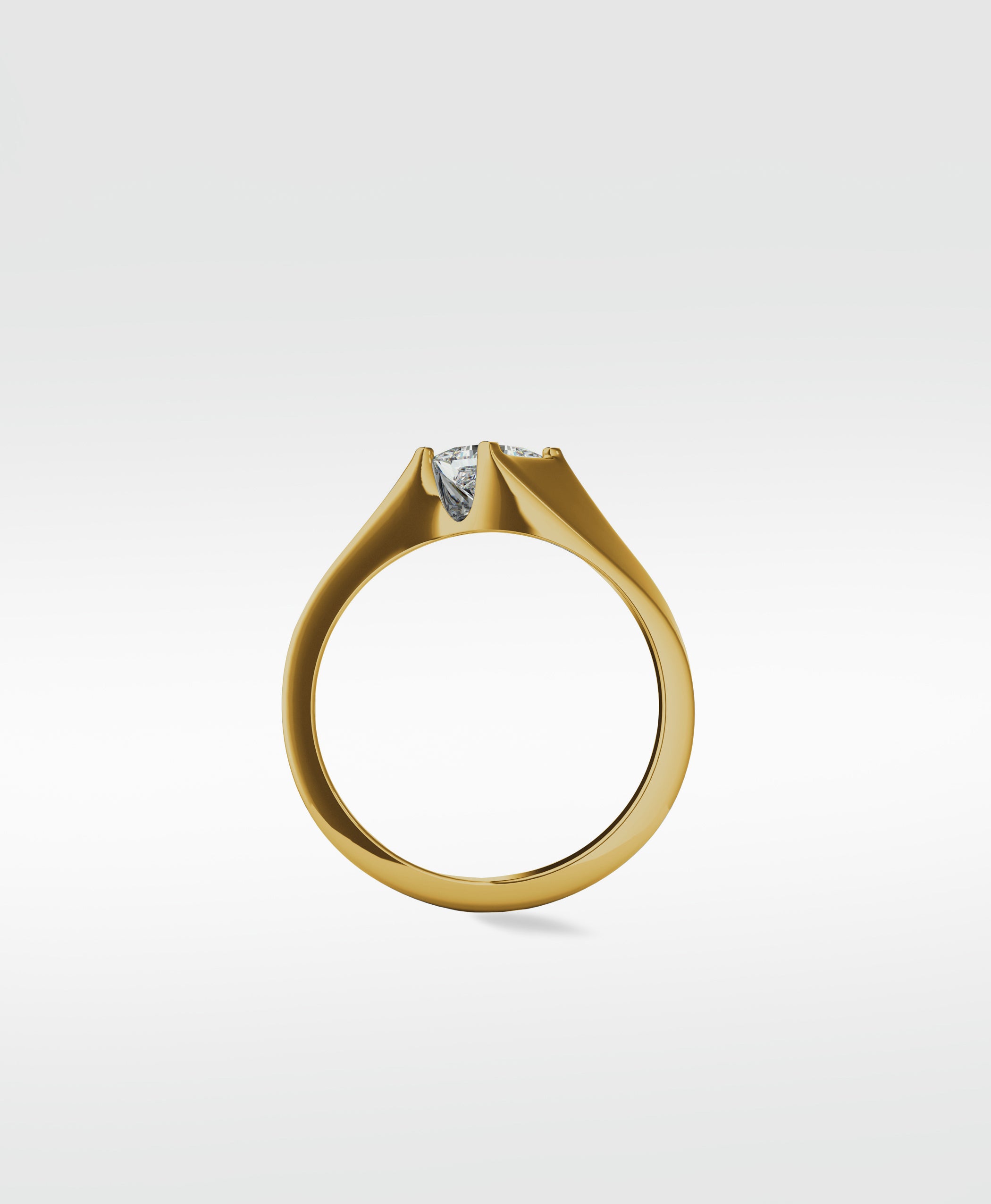 Profile view of the Elder Engagement Ring in yellow gold with a modern, clean-lined setting holding a princess cut diamond.