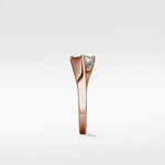 Side view of the Elder Engagement Ring in rose gold, showcasing its sculpted band and a brilliant princess cut diamond.