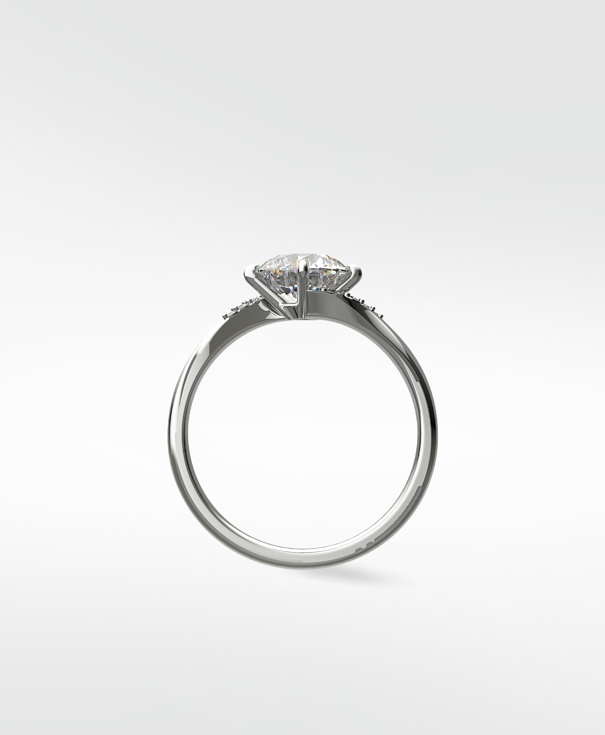 Side profile of the platinum Vine Diamond Engagement Ring, showing its brilliant-cut center diamond and pavé-accented band.