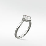 Vine Diamond Engagement Ring in platinum with a round brilliant cut center stone and delicate pavé diamond accents.