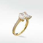 Wisteria Diamond Engagement Ring in yellow gold, featuring a Toi et Moi design with a pear and radiant cut diamond on a pavé band.