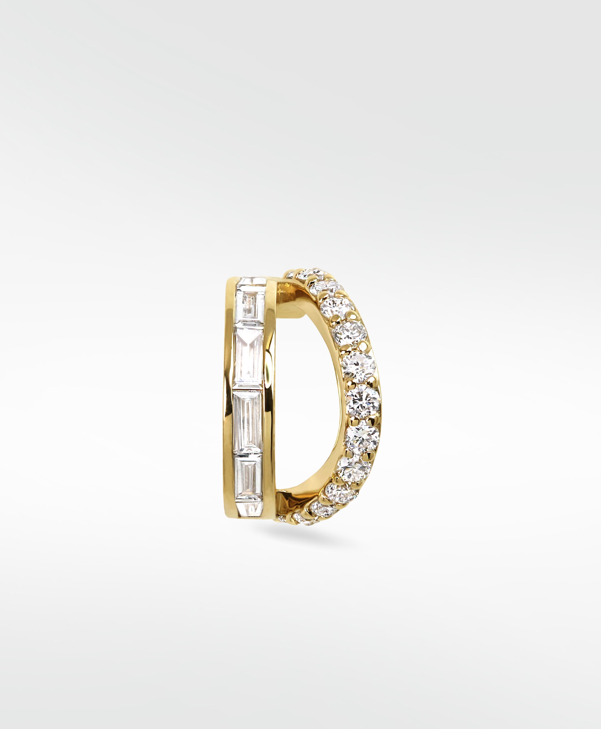 Modernist Double Diamond Hoop earring in yellow gold, featuring contrasting rows of baguette and brilliant-cut diamonds.