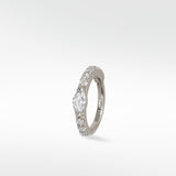 A Modernist Marquise Pave Hoop in white gold with a central marquise diamond and surrounding pavé stones.