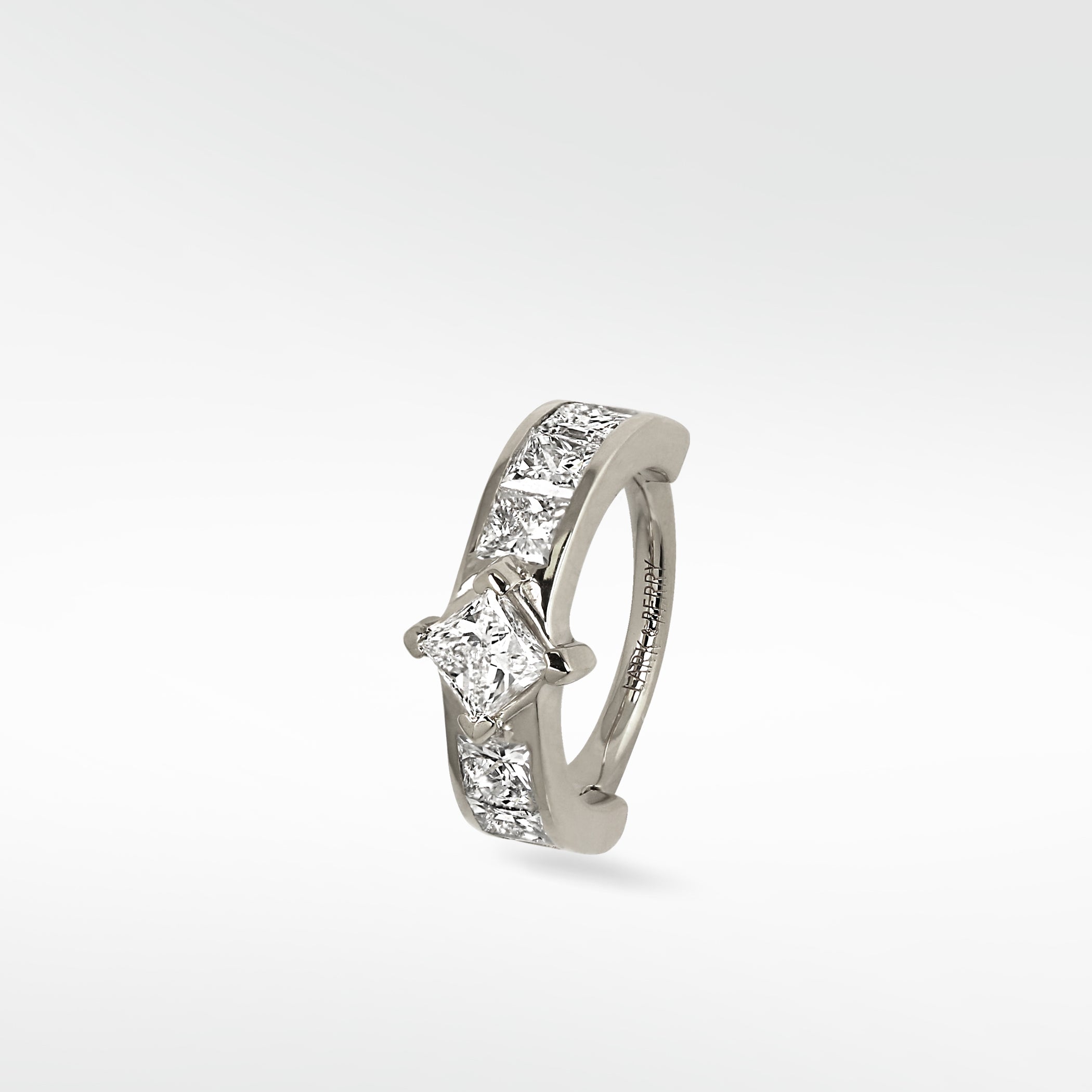 Lark & Berry Modernist Princess Cut Diamond Hoop earring in 14k white gold with channel-set diamonds.
