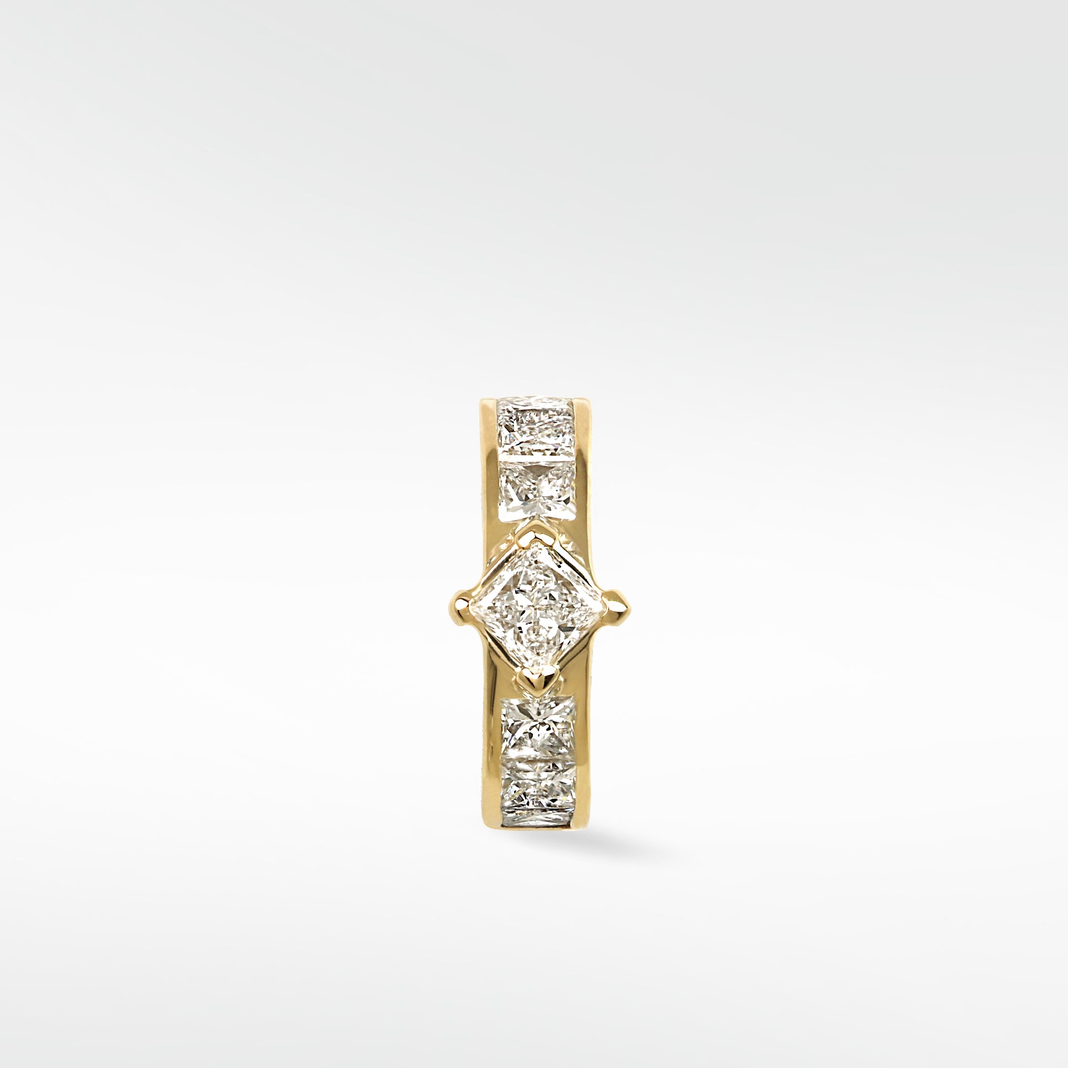 Front view of the Modernist Princess Cut Diamond Hoop in 14k yellow gold with channel-set diamonds.