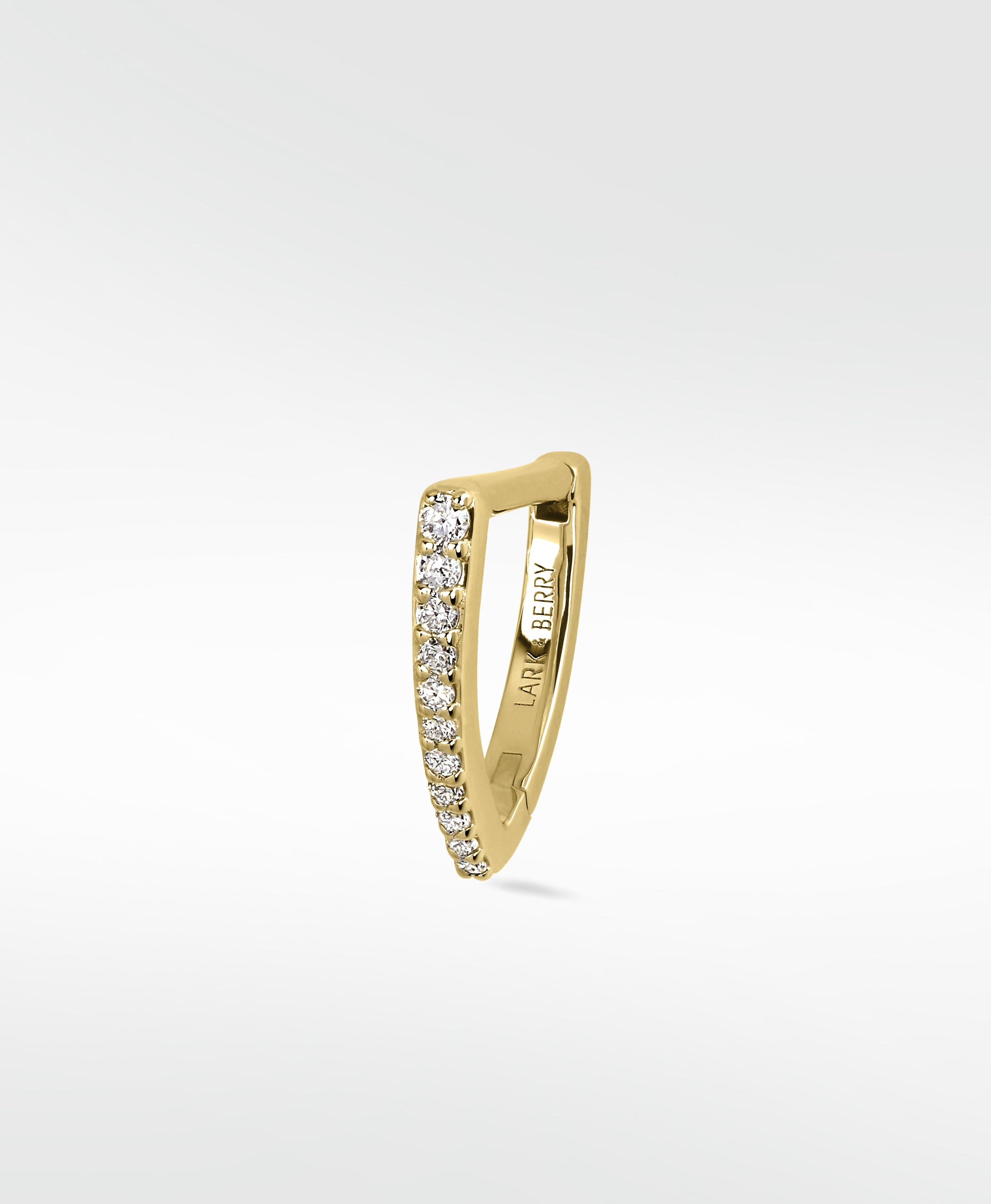Lark & Berry Modernist Graduating Pave Hoop in 14k gold, a pointed earring with a row of pave diamonds.