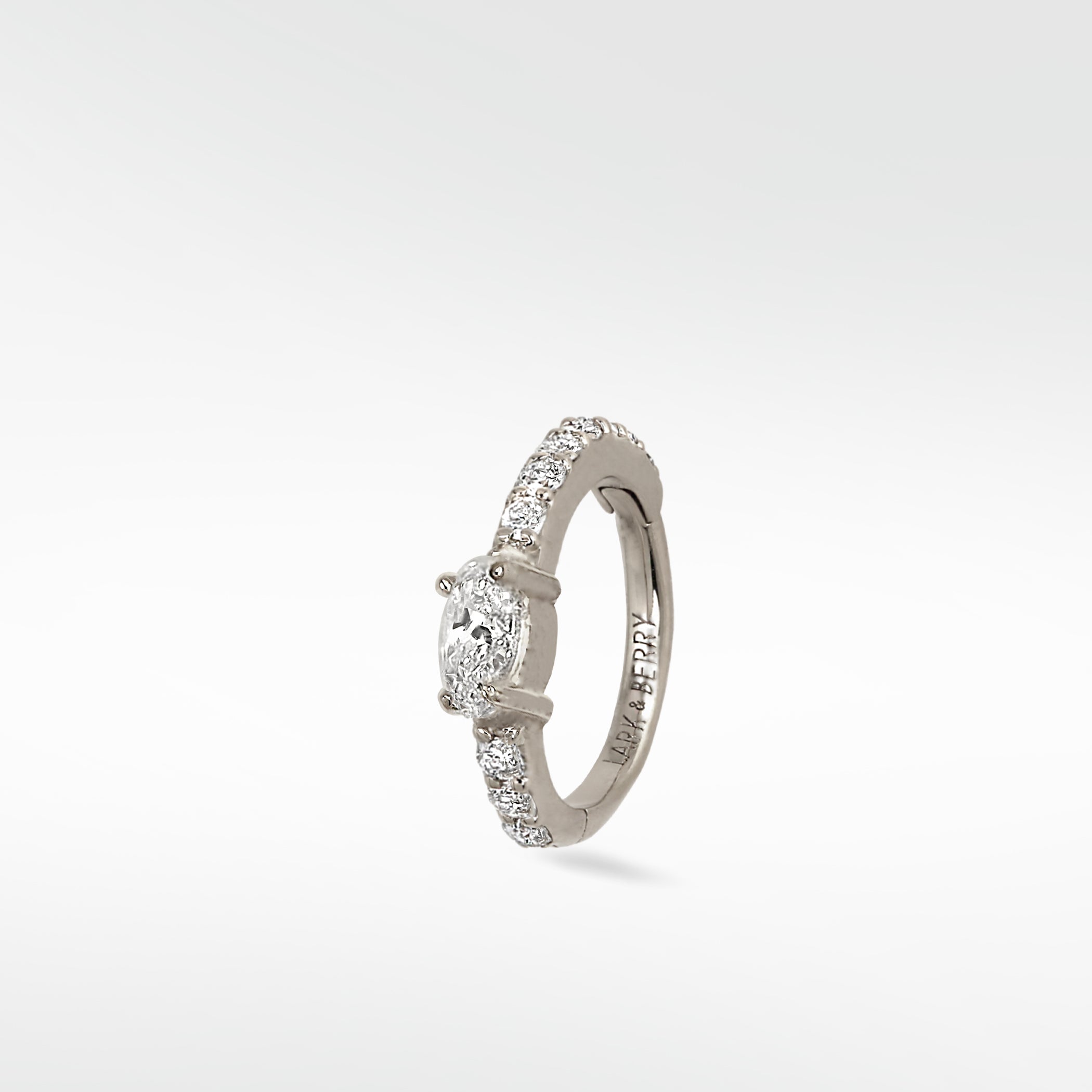 Lark & Berry Modernist Oval Diamond Hoop in white gold with a central oval diamond and pavé accents.