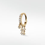 Lark & Berry Modernist Celestial Drop Hoop earring in gold with pavé diamonds and dangling star charms.