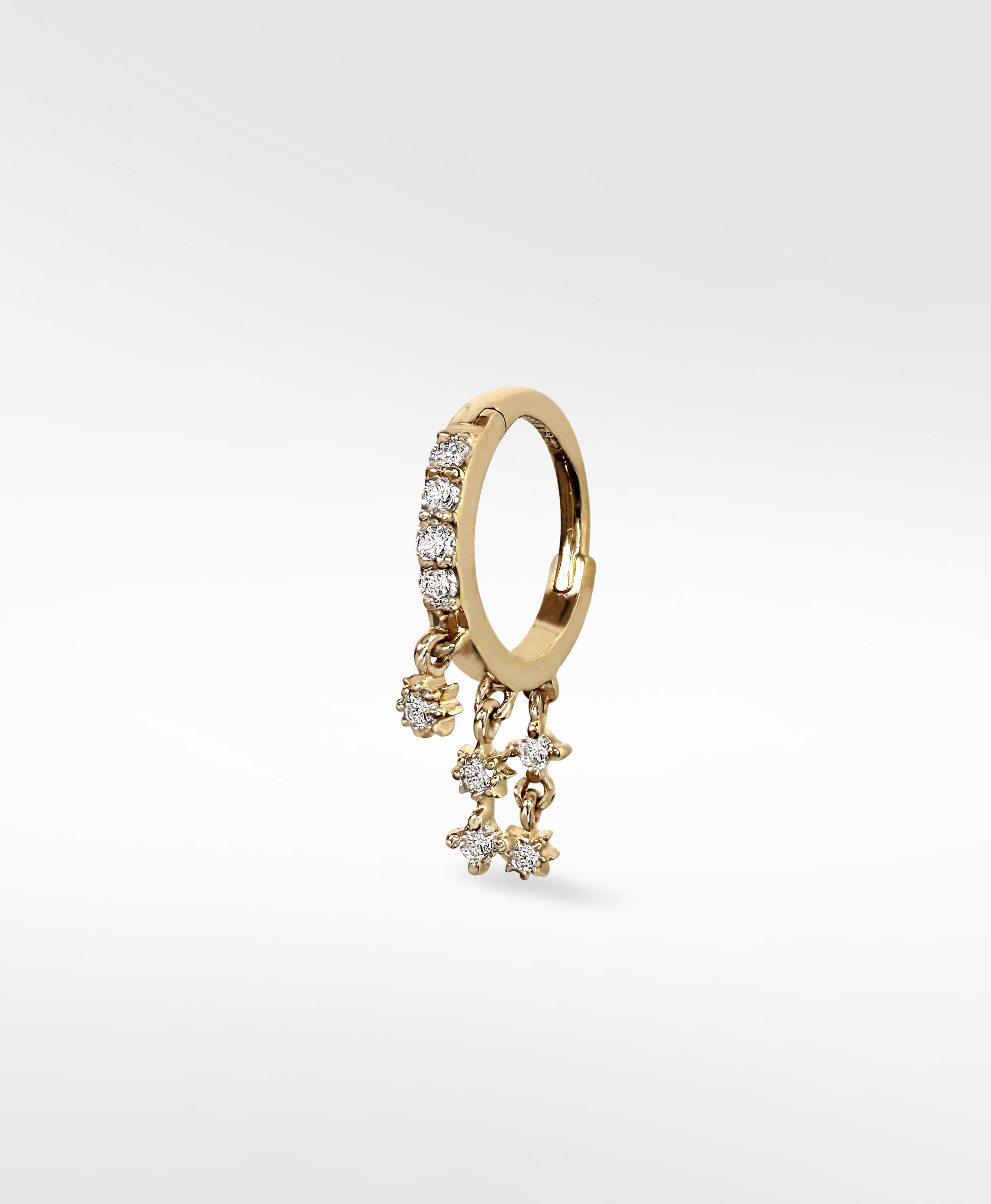 Lark & Berry Modernist Celestial Drop Hoop earring in gold with pavé diamonds and dangling star charms.
