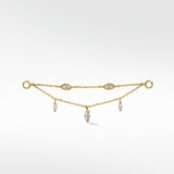 Lark & Berry Double Diamond Drop Chain in yellow gold with bezel-set and dangling marquise diamonds.