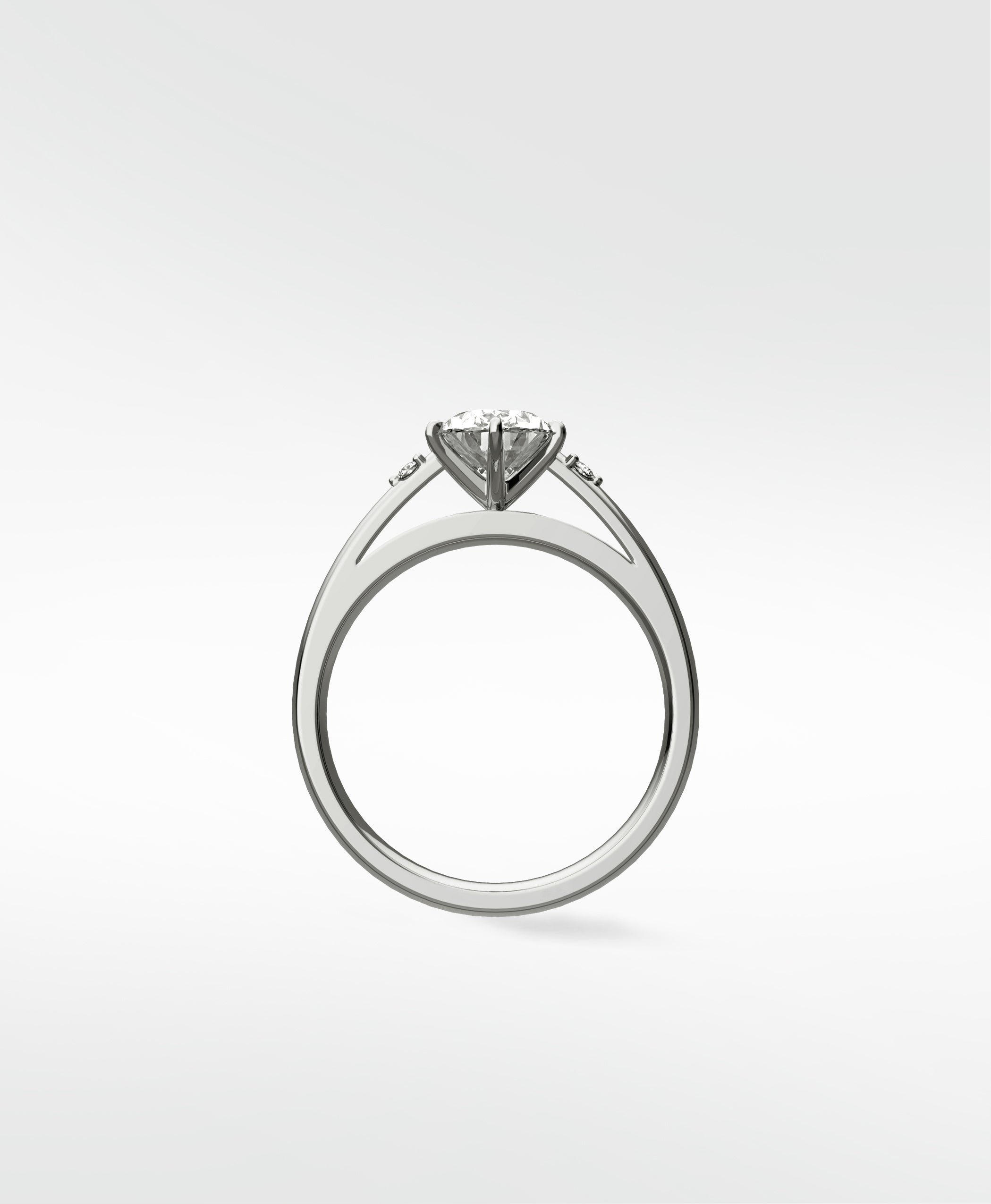 Side profile of the Kentia Engagement Ring in white gold, showcasing its open setting with accent diamonds on a split shank band.