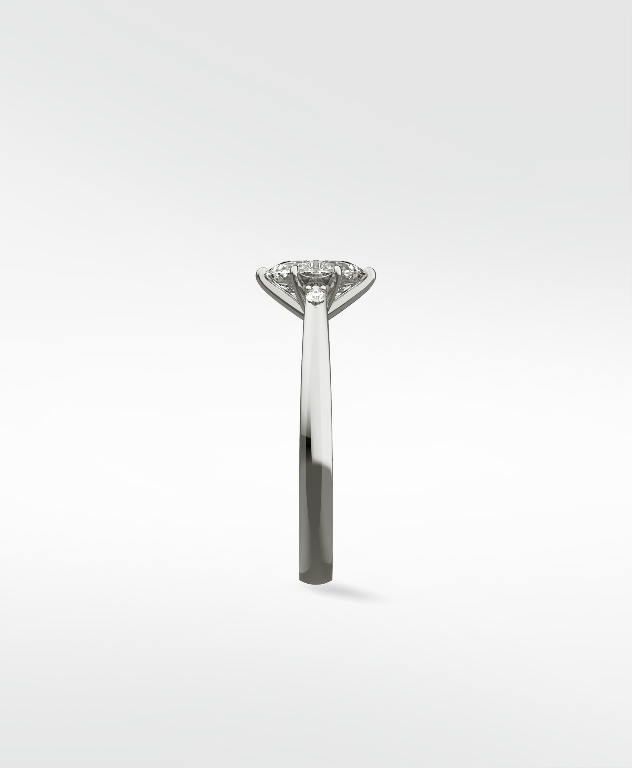 Side profile of the Kentia Engagement Ring in platinum, showing the open basket setting and side diamond detail.