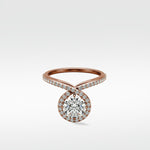 The Wild Cherry Diamond Engagement Ring in rose gold, with a round halo diamond on a twisted pavé band.