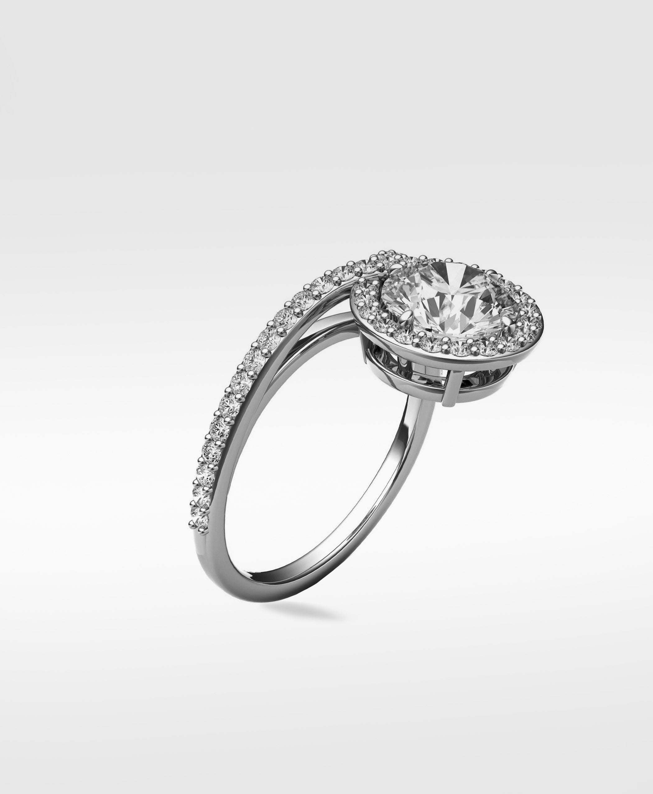 The Wild Cherry Diamond Engagement Ring shown at an angle, featuring a round halo setting and pavé bypass band.