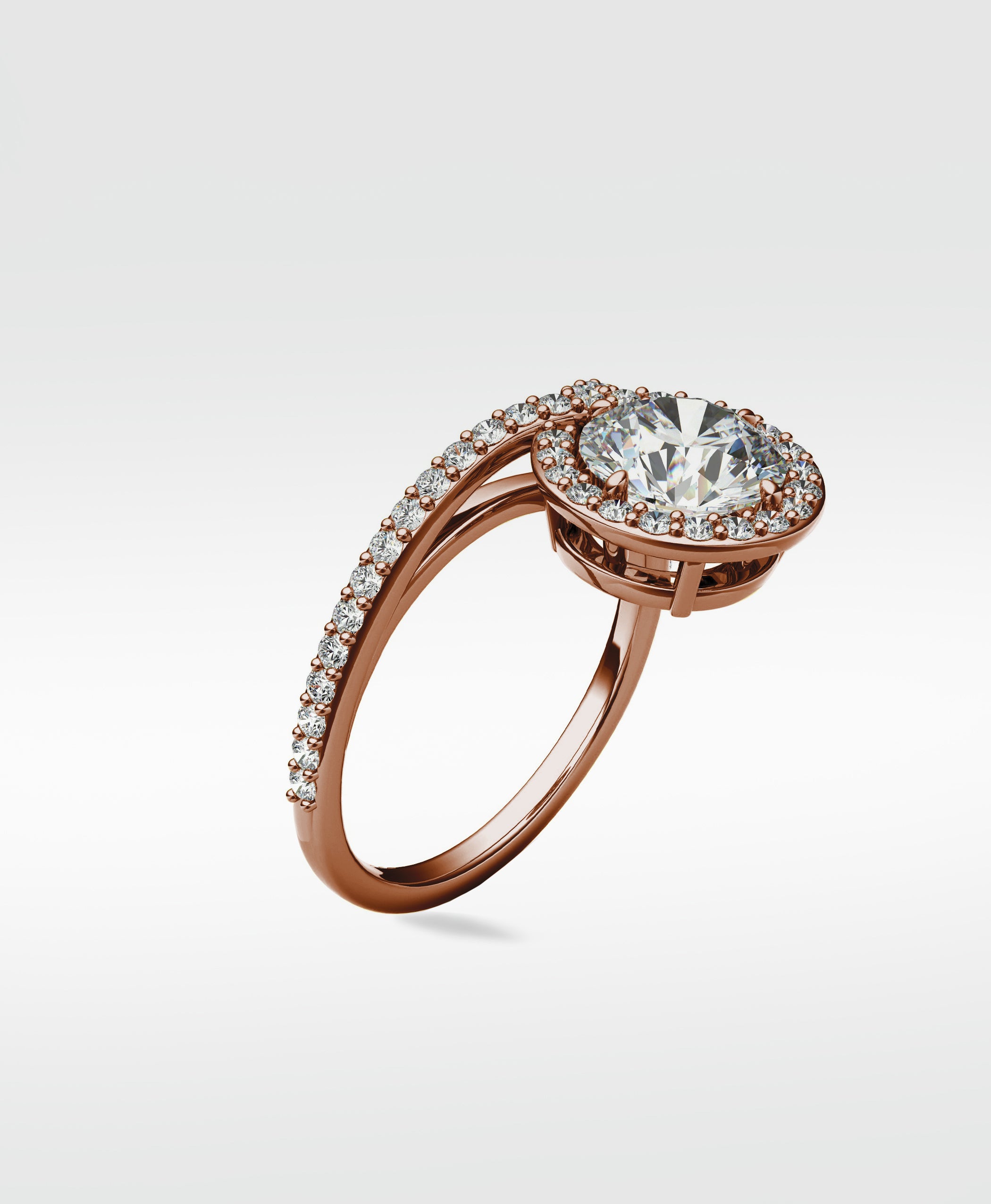 Wild Cherry Diamond Engagement Ring in rose gold with a round halo and pavé diamond band, shown on a white background.