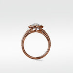 Side profile of the rose gold Wild Cherry Diamond Engagement Ring with a halo setting and pavé diamond band.