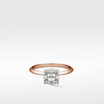 Lark & Berry's Walnut Engagement Ring featuring a brilliant cushion-cut diamond in a solitaire setting on a rose gold band.