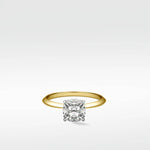 Walnut Engagement Ring with a cushion-cut diamond solitaire on a classic yellow gold band.