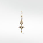 Celestial Diamond Charm in gold, with a diamond-studded hoop and a dangling star charm featuring a central round diamond.