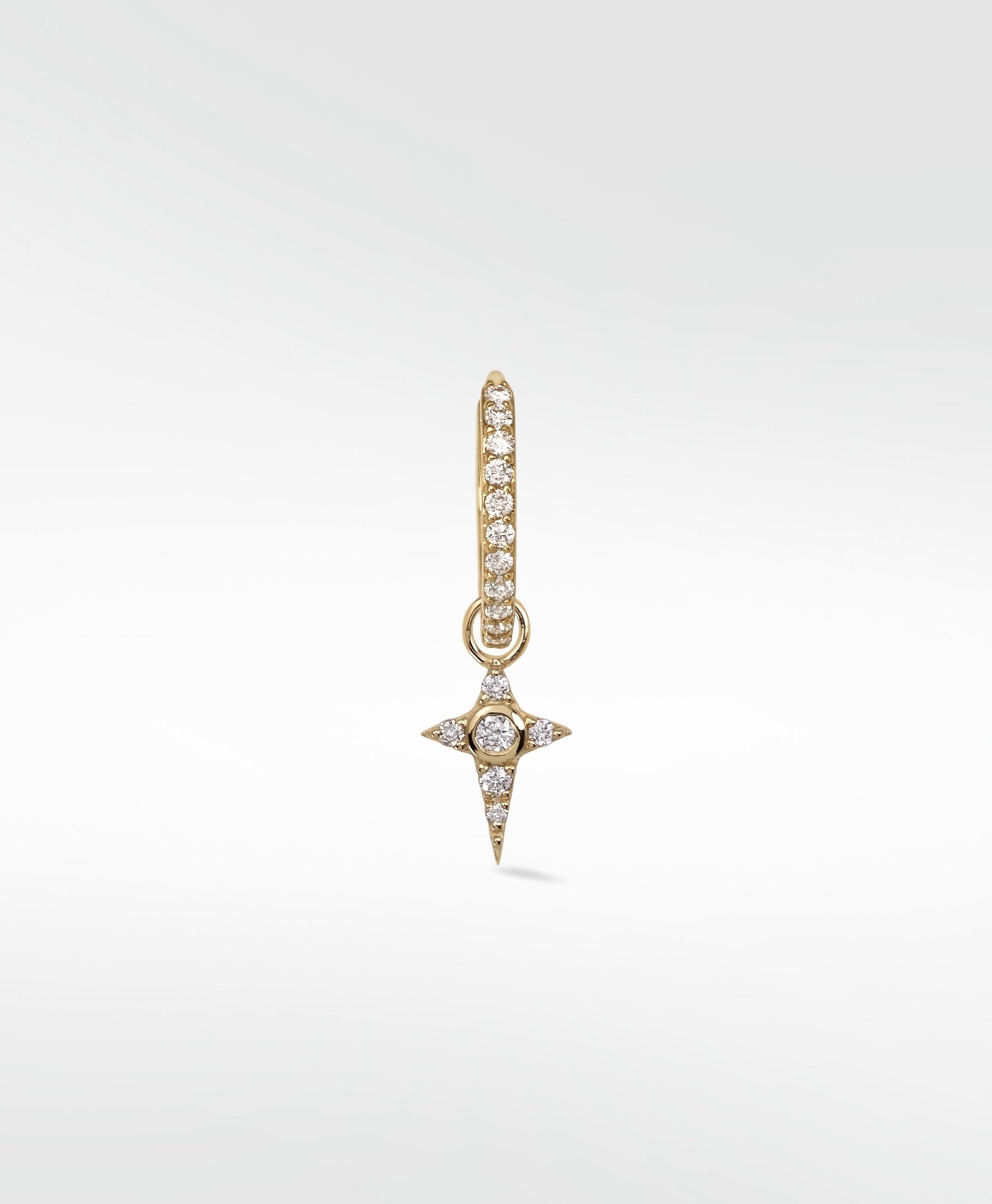 Celestial Diamond Charm in gold, with a diamond-studded hoop and a dangling star charm featuring a central round diamond.