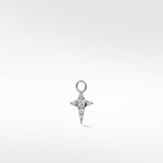 A four-pointed star Celestial Diamond Charm in white gold with a central diamond and pavé accents on a white background.