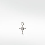 A four-pointed star Celestial Diamond Charm in white gold with a central diamond and pavé accents on a white background.