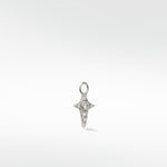 Lark & Berry Celestial Diamond Charm in white gold, shaped like a four-pointed star with a central round diamond.