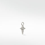 Lark & Berry Celestial Diamond Charm in white gold, shaped like a four-pointed star with a central round diamond.